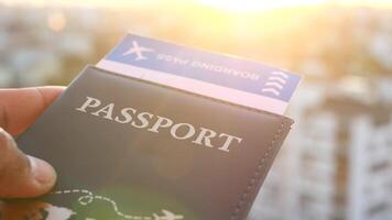 Preparing for travel with passport and boarding pass in hand video