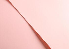 Peach pink paper background with a smooth matte surface and soft pastel tones. Warm and delicate, it photo