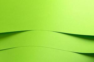 Lime green paper background with a smooth matte surface and a subtle gradient. Vibrant, bold tones photo
