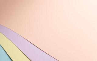 Pastel abstract geometric paper background featuring a multicolored composition in peach, lavender, photo