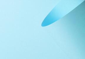 Light blue paper background with a smooth pastel surface and soft tones. Calm and serene, it photo