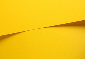 Lemon yellow paper background with a smooth matte surface and a radiant finish. Bright, sunny tones photo