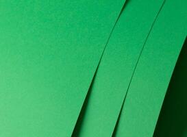 Eden green paper background with vertical, layered sheets and a smooth matte finish. Bright, vibrant photo