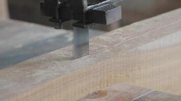 Woodworking with a table saw in a workshop video