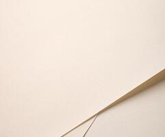 A cream white paper background with a warm, soft texture and a smooth matte finish. Its subtle beige photo