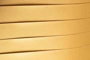 Yellow paper texture with a subtle striped pattern and torn edges, blank decorative background with photo