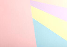 An abstract pastel paper composition featuring a geometric arrangement of multiple colors, including photo