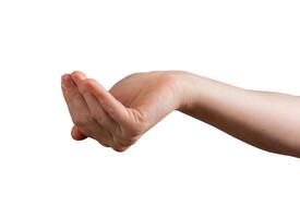 Female hand in cupped shape, fingers bent, palm open, symbolizing giving or holding something unseen photo