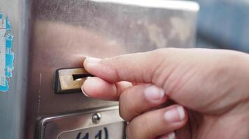 How to insert a coin into a public parking meter video