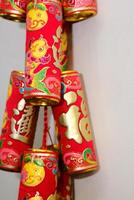 Chinese New Year Decorative Firecrackers with Gold Fish Design photo