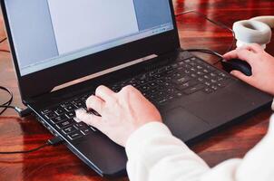 Productive Work Session on a Laptop Office Desk Setup banner ,copy space photo