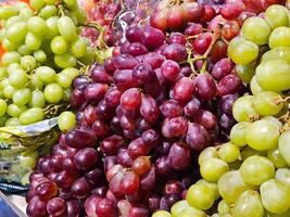 Purple Grape and green grape at supermarkets. photo