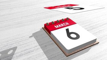 Close up of March month calendar with individual sheets flying upwards on a white wooden table with copy space. 3D Animation video