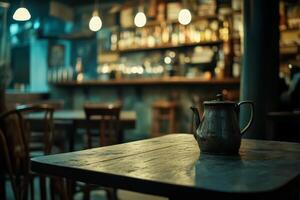 A wooden table with a teapot on it photo