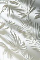 A white wall with a white paper cut out of leaves photo