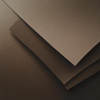 A stack of brown paper on a table photo