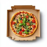 A pizza in a cardboard box on a white background photo