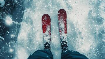 A pair of skis on the ground in the snow photo