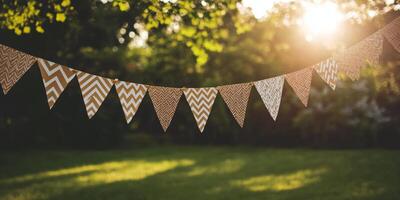A string of bunting flags hanging in the sun photo