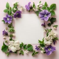 Flower frame on pink background with copy space for text photo