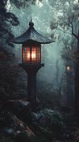 A lantern in the woods with fog and trees photo