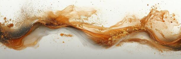A brown liquid is splashed on a white surface photo