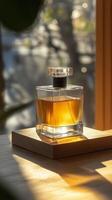 A bottle of perfume sitting on a table photo