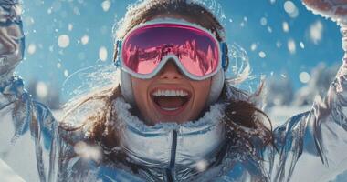 A woman in a ski mask and goggles is smiling photo