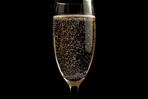 A glass of champagne on a black background photo