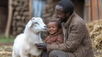 A man and a child petting a goat photo