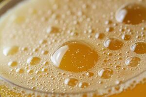 A close up of a glass of orange juice photo