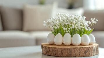 A wooden table with white eggs and lily of the valley photo