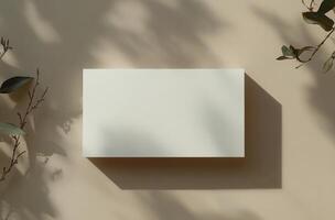 Blank white square on a beige background photo