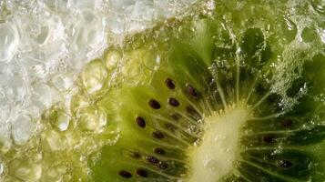 A close up of a kiwi fruit with water photo