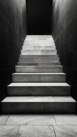 Black and white photo of stairs in a dark room