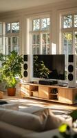 A living room with a tv and a plant photo