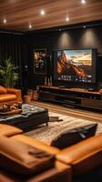 A living room with a large television and leather couches photo