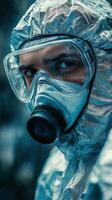 A man in a protective suit and mask photo