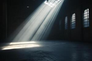 A dark room with sunlight shining through the windows photo