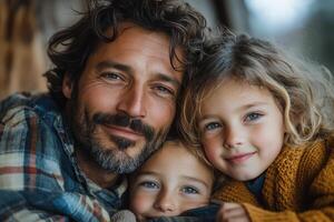A man and two children are posing for a photo