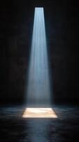 A light shining through a door into a dark room photo
