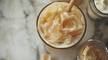 A glass of ice cream with a spoon in it photo