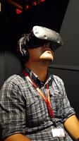 A man wearing a virtual reality headset photo