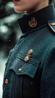 A woman in a military uniform is standing in the snow photo