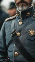 A man in a military uniform is standing in front of other men photo