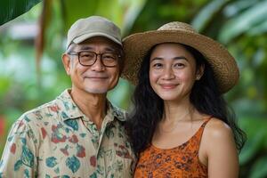 Asian couple in tropical garden photo