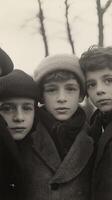 A black and white photo of three boys