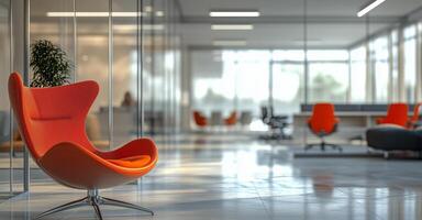 A modern office with a large glass wall and a chair photo