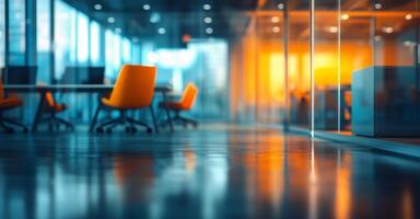 An empty office with orange chairs and a window photo