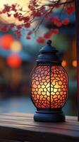 A decorative lantern sitting on a table photo